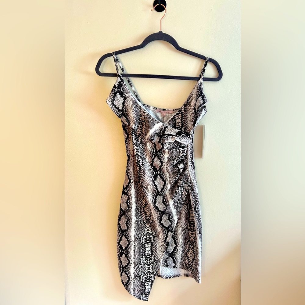 SMALL MINI SNAKESKIN PRINT DRESS. TAG ON - NEVER WORN. CRAVE FAME BRAND.